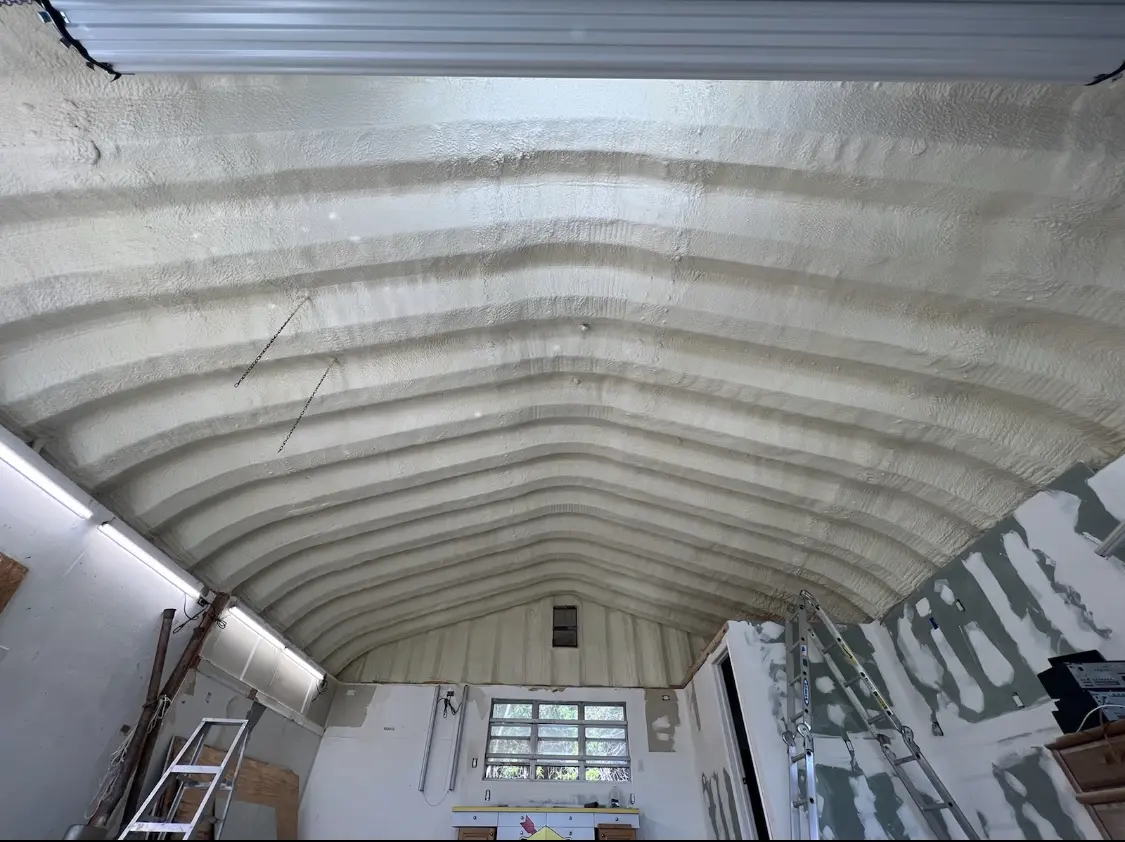 Spray polyurethane foam applied to the underside of a metal roof deck in Chino Valley